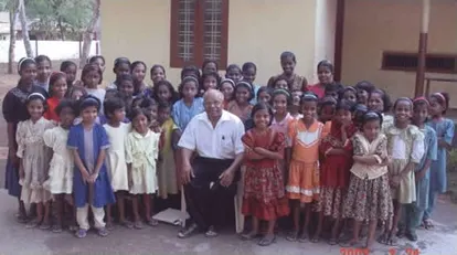 A group of children with an India Evangelical Mission worker