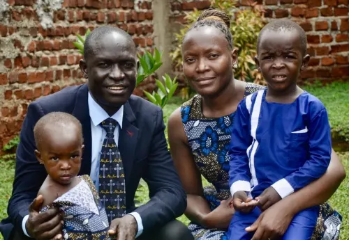 Robert and Caroline Wafula with their two children